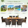 9 Pieces Rattan Dining Set with Acacia Wood Table and Stackable Cushioned Chairs